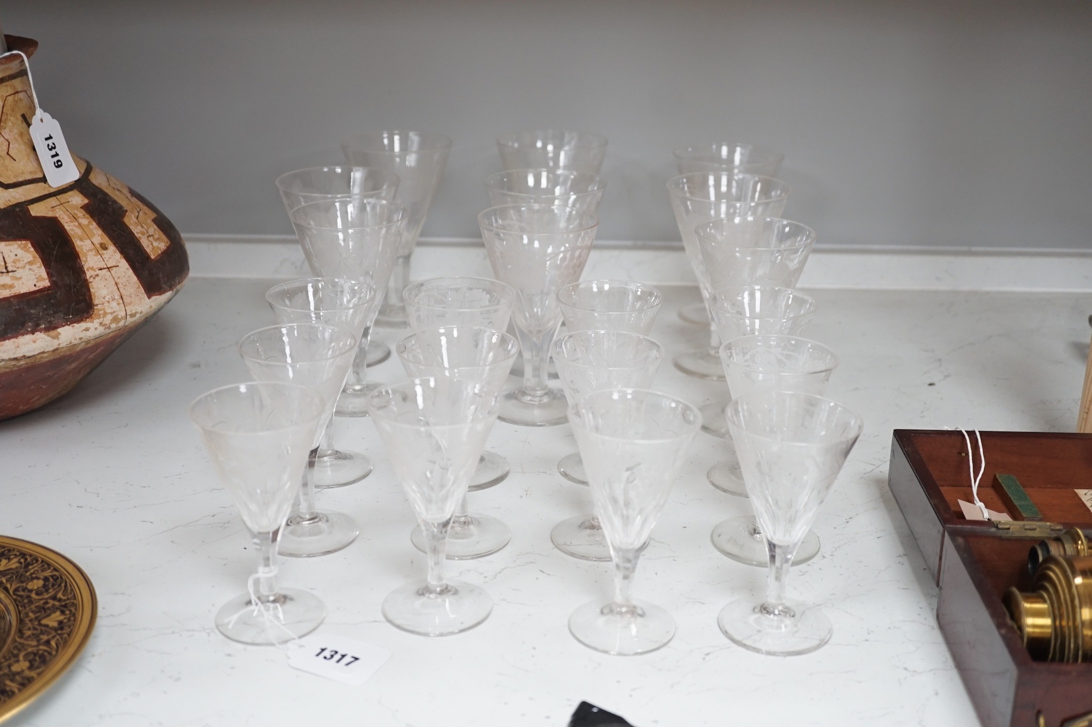 A part suite of Edwardian vineous etched glasses. Tallest 15cm